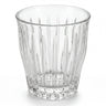 Verre à espresso facetté transparent, vue de face sur fond blanc.